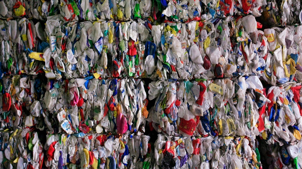 Recyclable materials compressed into large cubes
