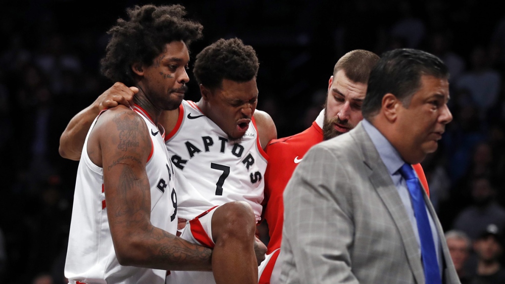 Kyle Lowry is carried off in New York