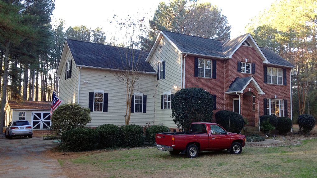 Cars are parked at a home in York, S.C.