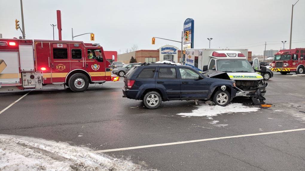 Ambulance and car collide 
