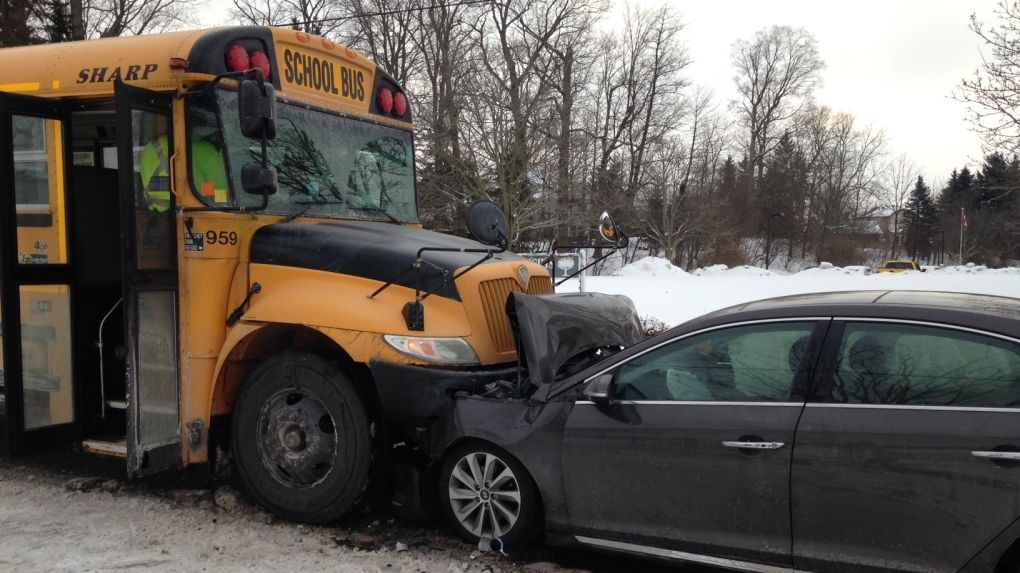 School bus and car collide