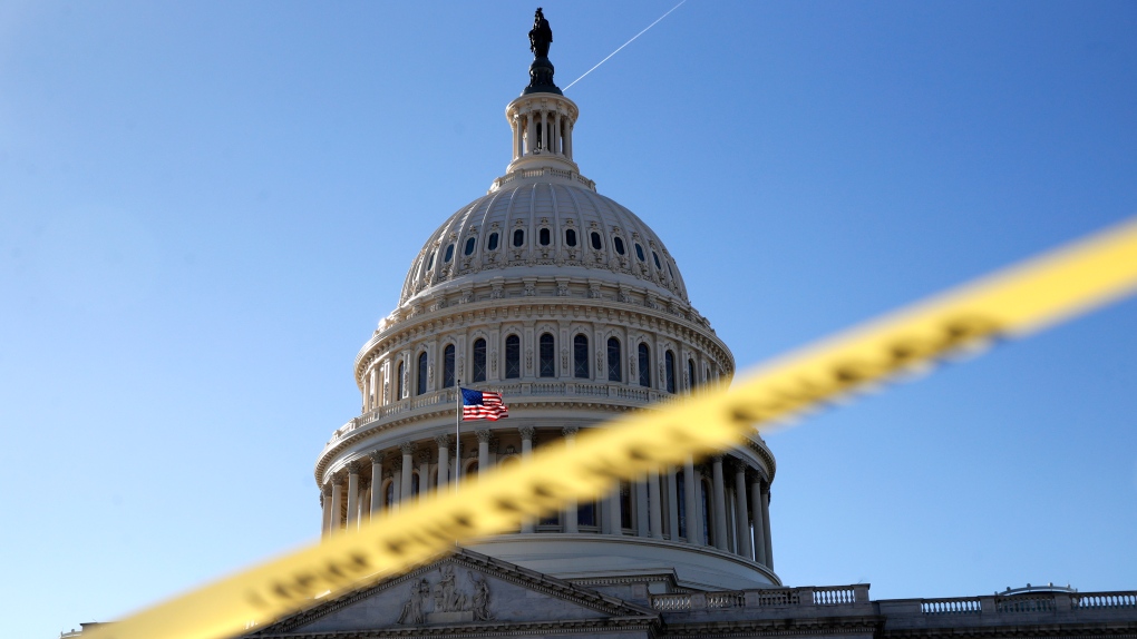 Police tape marks a secured area of the Capitol