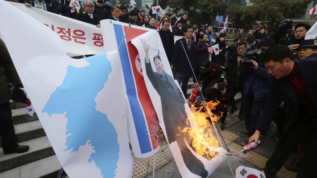 Burning a portrait of Kim Jong Un in Seoul