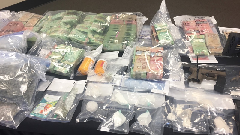 Strathcona County RCMP released photos of drugs and cash seized as part of a drug trafficking investigation in mid-December, 2017. Supplied.