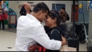 Vaibhav Thakar dances with his wife Himadri in this screenshot taken from a video from Skyxe Saskatoon Airport. Thakar greeted his wife with a special dance at the airport as she arrived to Canada for the first time Monday, Jan. 22, 2018. (Skyxe Saskatoon Airport/Facebook)