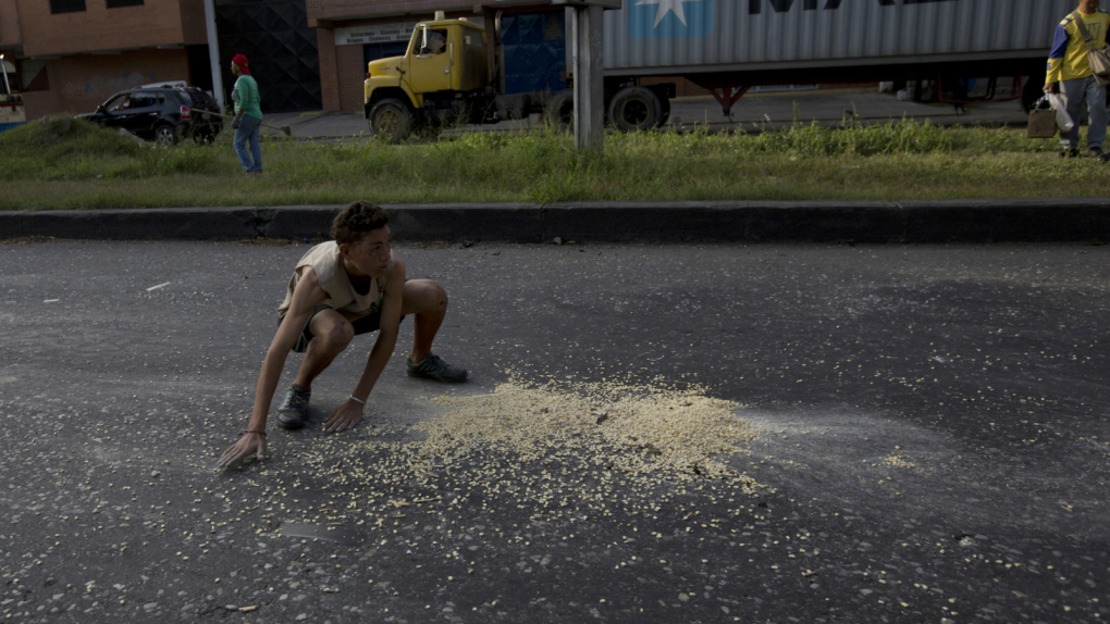 Looters look for food in Venezuela