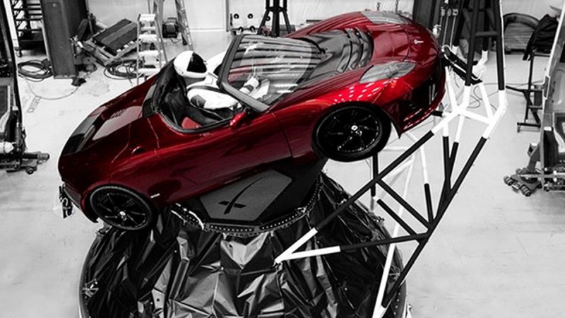 A mannequin 'Starman' sits at the wheel of a Tesla Roadster in this photo posted on the Instagram account of Elon Musk, head of auto company Tesla and founder of the private space company SpaceX.  (Courtesy of Elon Musk/Instagram via AP)