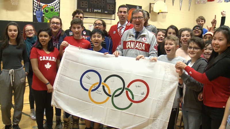 Glashan students pose with Ottawa Mayor Jim Watson as they wish Team Canada good luck ahead of the 2018 Winter Olympics in PyeongChang, South Korea. 