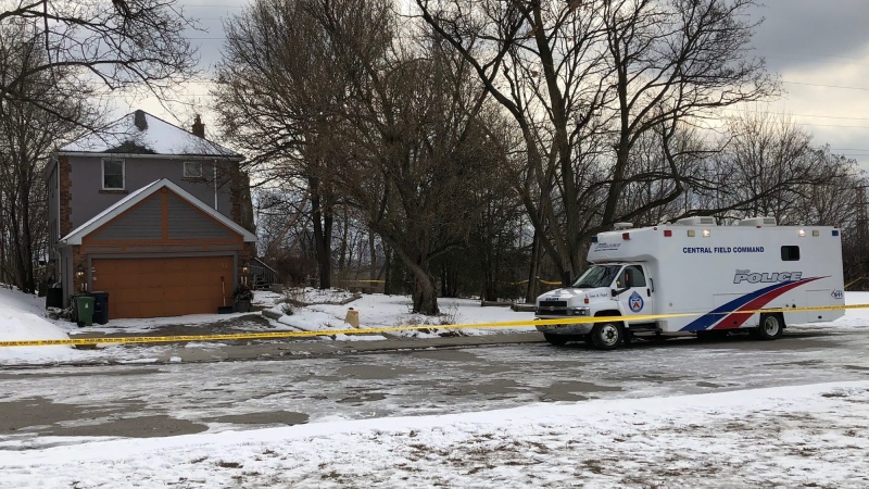 In this Saturday, Feb. 3, 2018 photo, crime scene tape surrounds a property where police say they recovered the remains of at least six people from planters on the property which is connected to alleged serial killer Bruce McArthur, in Toronto, Canada. (AP Photo / Rob Gilles)