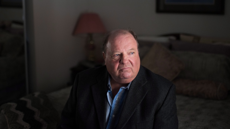 Rick Brown sits for a portrait in his room in Kitchener Ont. on Thursday, Feb.8, 2018. In October 1963, a judge ordered Brown to Brookside, the reform school in Cobourg. The only paper record he still has of his stay there is the Bible they gave him that first day of his year in hell, as he puts it. THE CANADIAN PRESS/Hannah Yoon