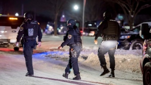 Detroit standoff ends; gunman, 3 women dead, officers hurt