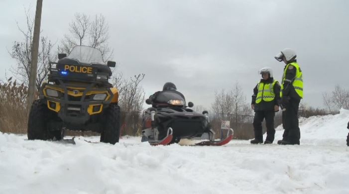 Surete du Quebec snowmobilers