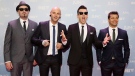 Members of the band Hedley pose on the red carpet during the 2015 Juno Awards in Hamilton, Ont., on Sunday, March 15, 2015. THE CANADIAN PRESS/Peter Power
