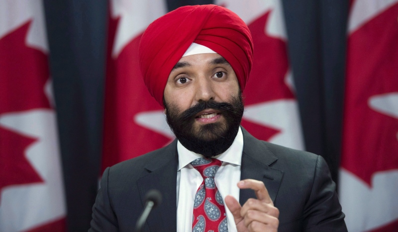 Navdeep Bains, Minister of Innovation, Science and Economic Development, speaks at an announcement on fighter jets at the National Press Theatre in Ottawa on Tuesday, Dec. 12, 2017. (THE CANADIAN PRESS/Sean Kilpatrick)