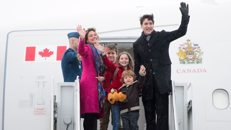 Prime Minister Justin Trudeau, right, departs Ottawa with his wife Sophie Gregoire Trudeau, left to right, and children Xavier, Ella-Grace and Hadrien on Friday, Feb. 16, 2018., en route to India. THE CANADIAN PRESS/Sean Kilpatrick