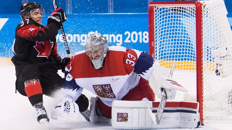 Czech Republic goaltender Pavel Francouz (33) stops Canada defenceman Mat Robinson (37) on a breakaway during overtime men's Olympic hockey action at the 2018 Olympic Winter Games in Gangneung, South Korea on Saturday, February 17, 2018. THE CANADIAN PRESS/Nathan Denette