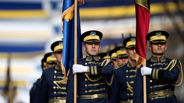 Kosovo Security Force members march 