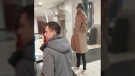 Two men disguised as one very tall man stand in line for 'Black Panther' in Carson, Calif., on Feb. 16, 2018. (Twitter / @stevelikescups)