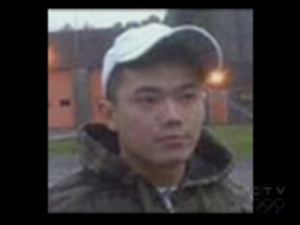 Alleged UN Gang member Dilun Heng was taken into custody by Vancouver Provincial Court Sheriffs shortly after noon Wednesday. May 20, 2009. (CTV)