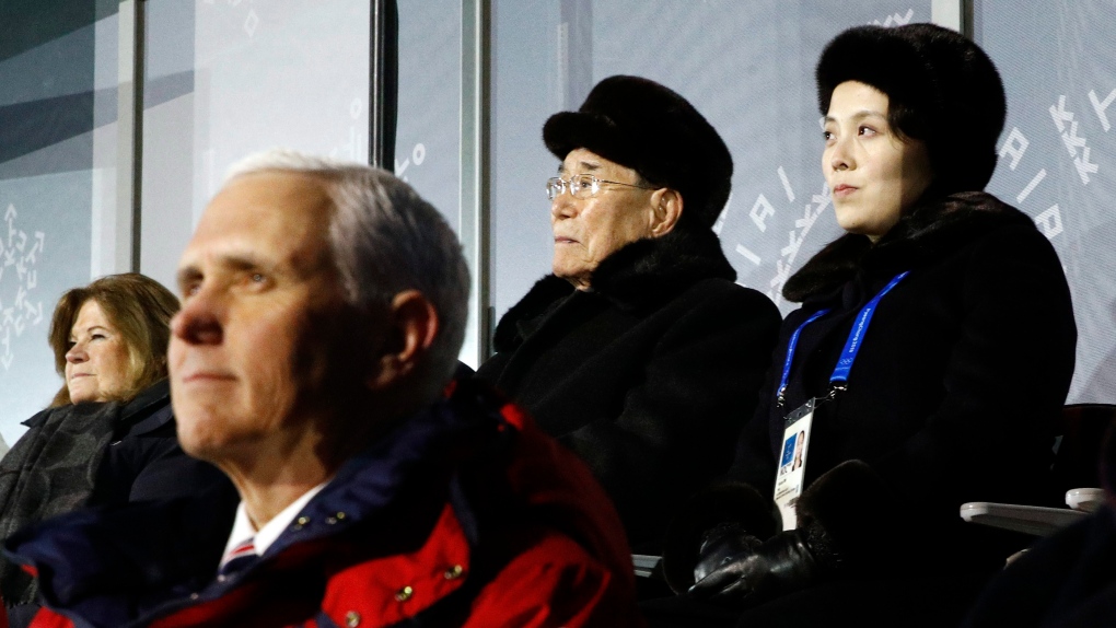 Mike Pence seated in front of Kim Yo Jong
