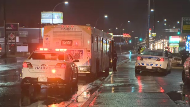 Police attend the scene of a crash involving a Halifax Transit bus on Tuesday, Feb. 20, 2018. 