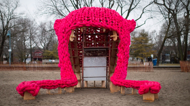 A pink toque inspired"'Pussy Hut" is pictured on Toronto's beach Wednesday February 21, 2018. A massive pink toque has taken over a stretch of a Toronto beach a year after thousands of protesters donned bright pink hats to protest gender inequality. THE CANADIAN PRESS/Chris Young