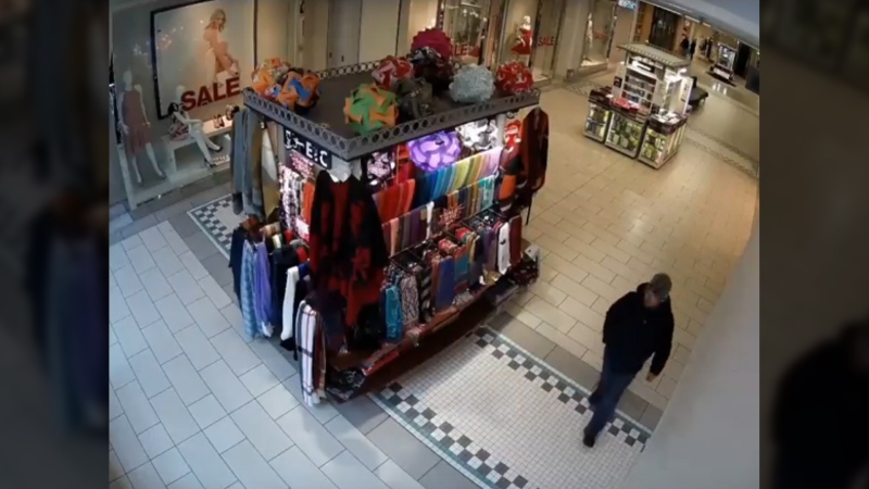 New security footage from The Bay Centre in Victoria shows a man accused of sexually assaulting a 12-year-old girl in a store walking past a mall kiosk before heading north on Douglas Street. (Police Handout)
