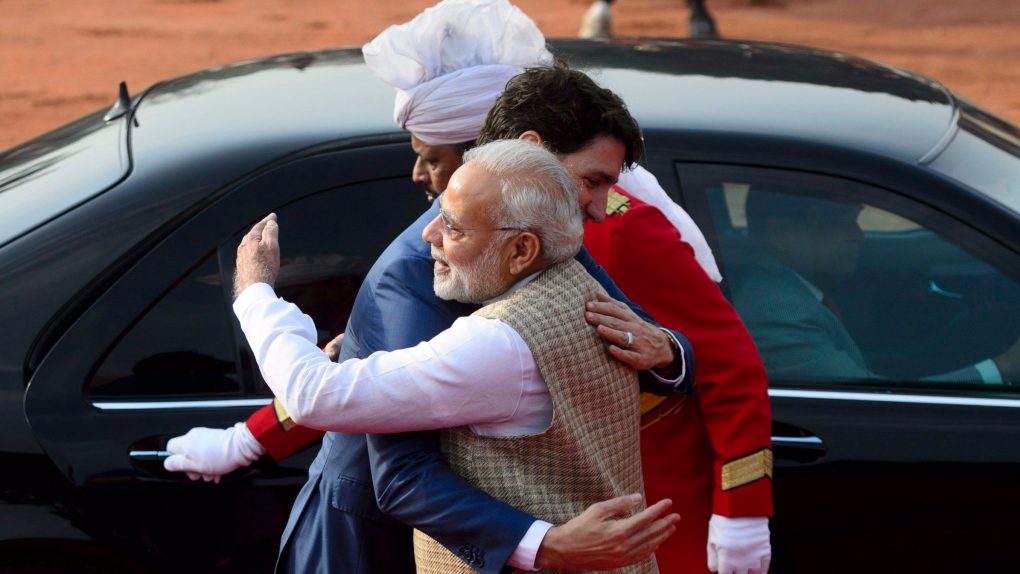 Trudeau Modi hug