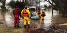 Emergency personnel rescued 13 people from their homes in Chatham on Saturday, Feb. 24, 2018.
