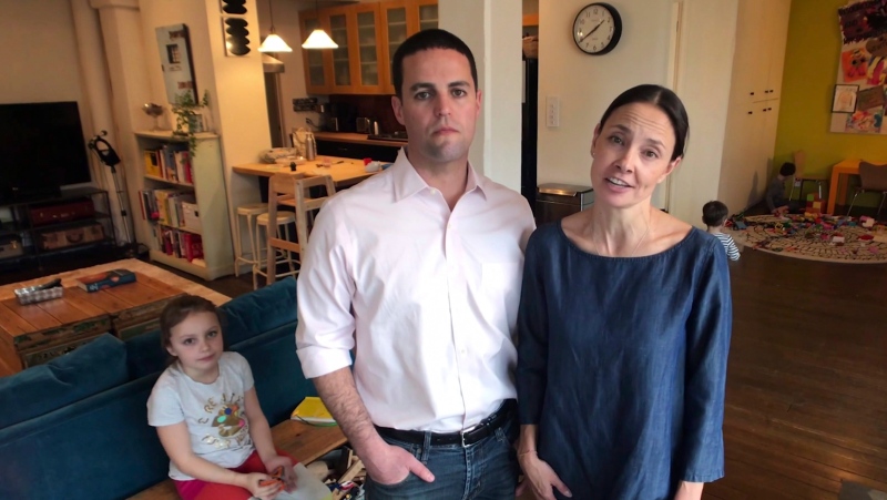 In this still image from an undated video, provided by the nonprofit Lulu & Leo Fund, Kevin and Marina Krim appear with their daughter Nessie, left, in a video message about the fund in New York. (Lulu & Leo Fund via AP)