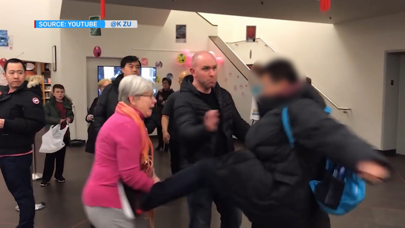 Video from the meeting shows a man speaking with the woman when he suddenly lunges forward, kicking her in the stomach before fleeing the scene on foot. 
