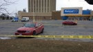 The scene of a stabbing death of 23-year-old Kalen Bryan-Bradley in the parking lot of Billings Bridge Mall is surrounded by police tape as they investigate Ottawa's seventh homicide of 2018. (Jim O'Grady/CTV Ottawa)