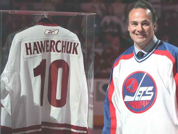 Former Winnipeg Jets player Dale Hawerchuk has his number retired before the Phoenix Coyotes' NHL hockey game against the Los Angeles Kings on Thursday, April 5, 2007, in Glendale, Ariz. (AP Photo / Rick Scuteri)