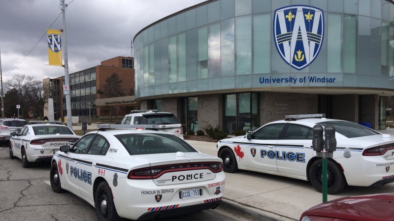 Windsor police cruisers are parked out out front of the Odette School of Business at the University of Windsor on March 13, 2018. Two people suffered burns and police are actively investigating. (Peter Langille / AM800 News)