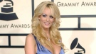 In this Feb. 10, 2008 file photo, adult film star Stormy Daniels arrives at the 50th Annual Grammy Awards in Los Angeles. (AP Photo/Chris Pizzello, File)