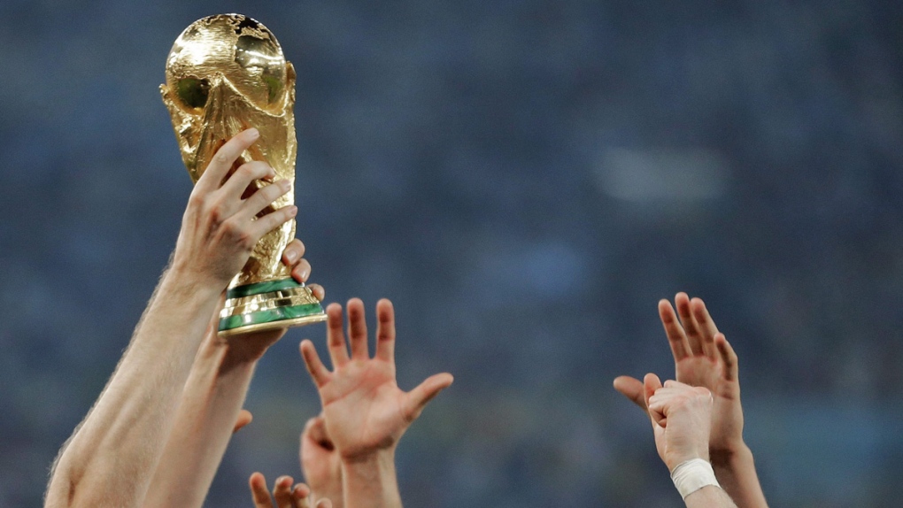 Reaching for the FIFA World Cup Trophy