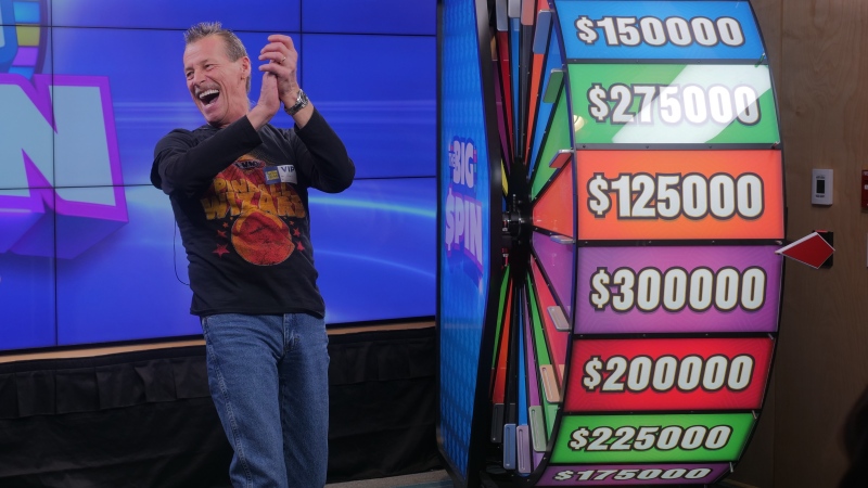 Christopher Ouellette won the top prize of $300,000 after spinning the wheel at the OLG Prize Centre in Toronto. (Courtesy OLG)