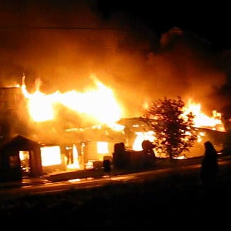 Flames consume a two-storey apartment building in Pembroke, Wednesday, May 27, 2009. Submitted by MyNews user Jason Liedtke