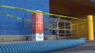 Safety tape outside of the Walmart in Shawnessy after the store was evacuated due to leaks from the roof