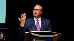Bell Canada President and CEO George Cope receives the Miner’s Lamp Award during an event in Toronto.