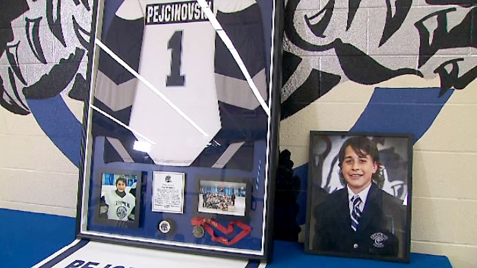 The minor league hockey jersey and number belonging to Roy Pejcinovski, the 15-year-old victim of a triple murder in Ajax, was formally retired by his school on March 28, 2018.