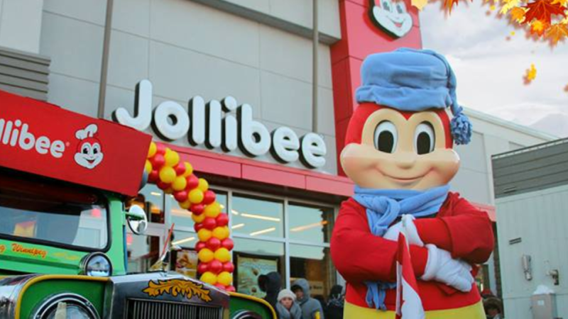 The Jollibee mascot is seen standing in front of one of the company's Winnipeg locations. (Jollibee/Twitter) 