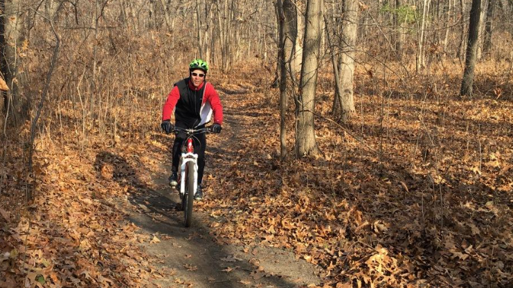 A cyclist uses paths snaking through Black Oak Heritage Park in Windsor's west-end on Sunday Dec. 3, 2017. (Photo by AM800's Gord Bacon)
