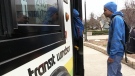 An undated image of a rider boarding a Transit Windsor bus. (File) 