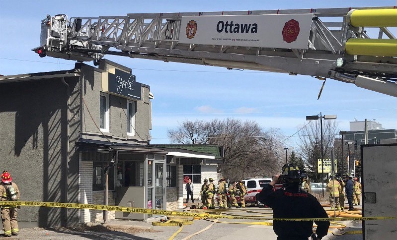 Ottawa Firefighters battle a fire at Napolis Westboro on Richmond Road April 9, 2018. (Ottawa Fire / Twitter)
