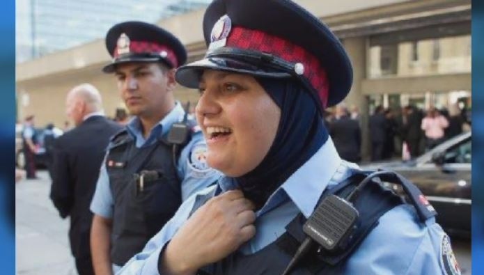 Could a police officer who wears a hijab be fired?