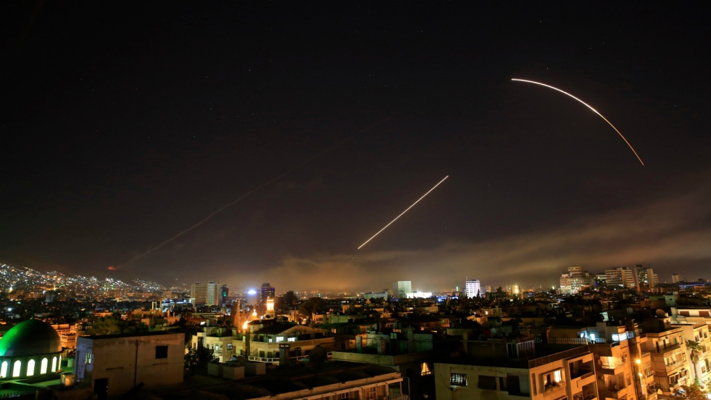 Missiles streak across the sky in Syria