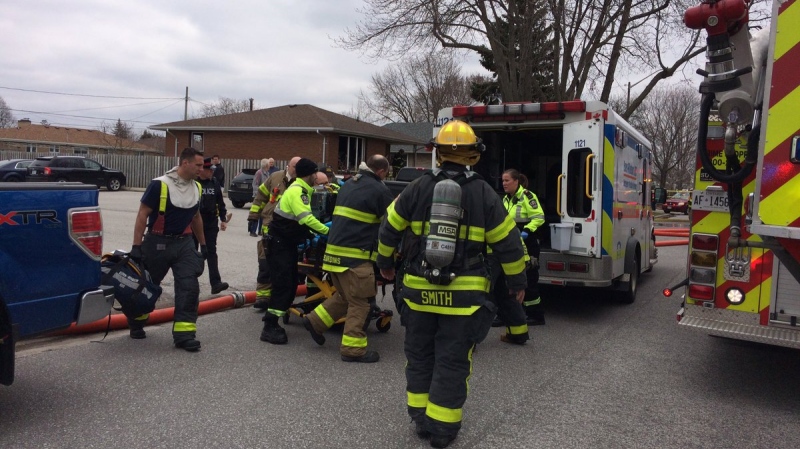 One person was taken to hospital after a house fire on Aubin Road in Windsor, Ont., on Wednesday, April 18, 2018. (Teresinha Medeiros / AM800)