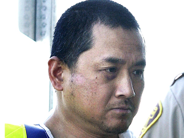 Vince Li is accused of beheading in Tim McLean on a Greyhound Bus last summer. He appears in court a Portage La Prairie court Tuesday, August 5, 2008. (THE CANADIAN PRESS/ John Woods)