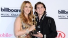 Celine Dion, left, and her son Rene-Charles Angelil, pose in the press room at the Billboard Music Awards at the T-Mobile Arena on Sunday, May 22, 2016, in Las Vegas. (Photo by Richard Shotwell / Invision / AP)